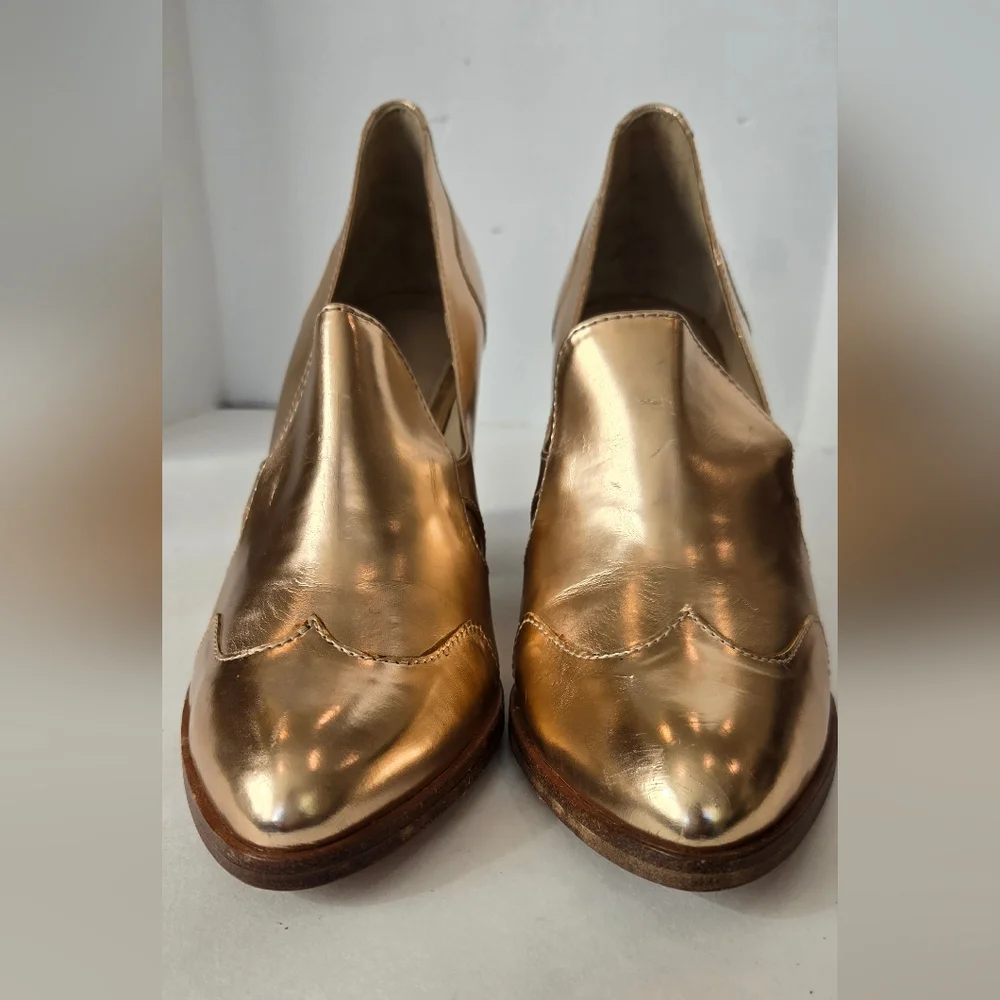 The office of Angela Scot Elegant Rose Gold Metallic Heels
